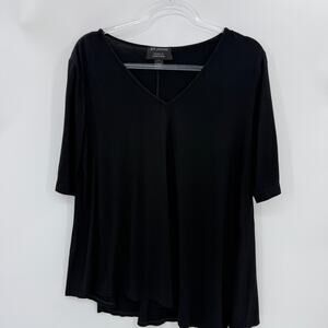 ST JOHN Black Jersey Stretch Shirt Size L Short Sleeve Asymmetrical Swing Hem